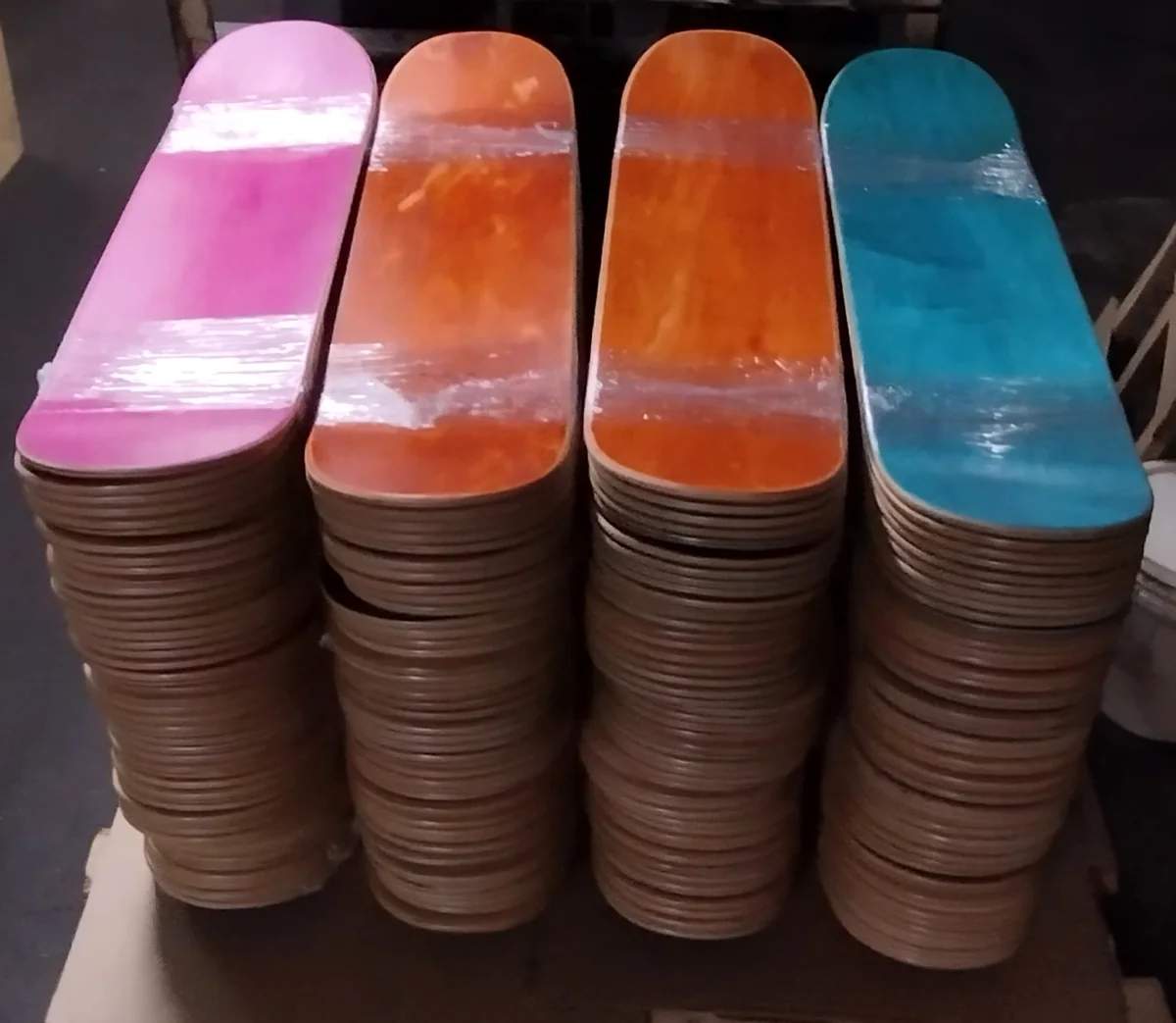 Finished blank skateboard decks produced at Empire