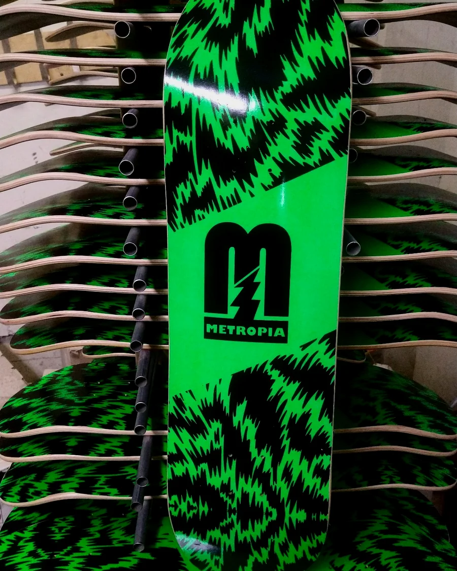 Metropia green and black printed skateboard production run