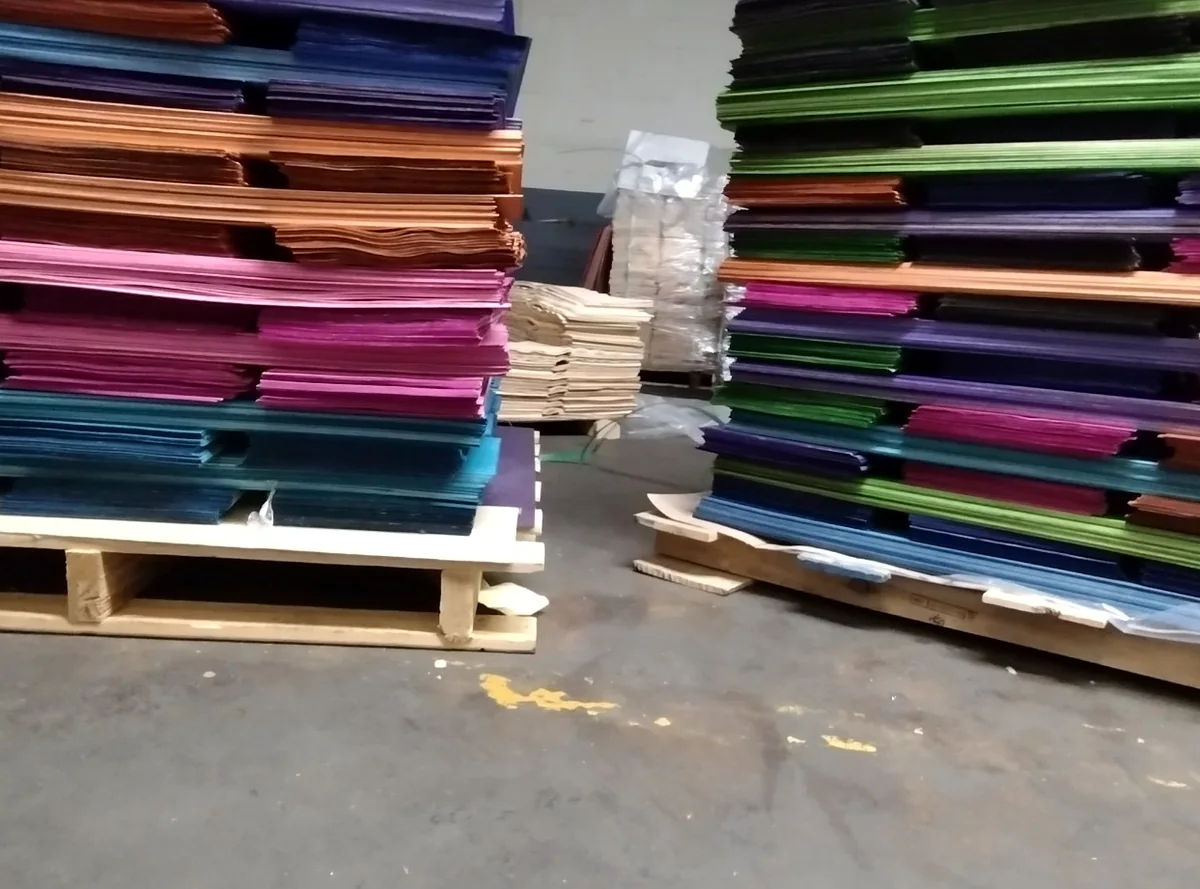 Pallets of dyed skateboard veneer inventory