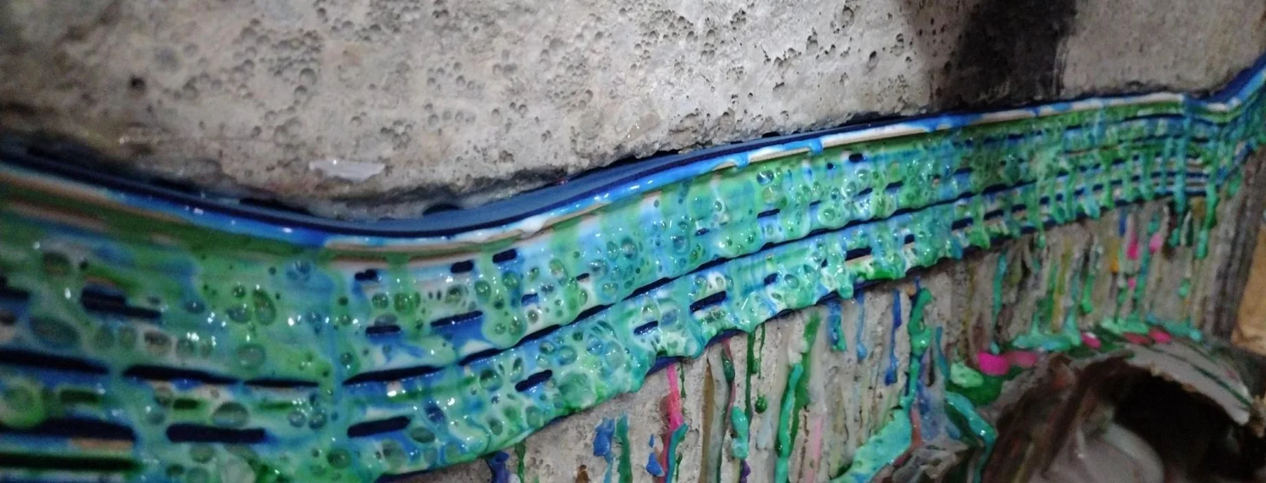 Colored glue squeeze-out on skateboard deck layup
