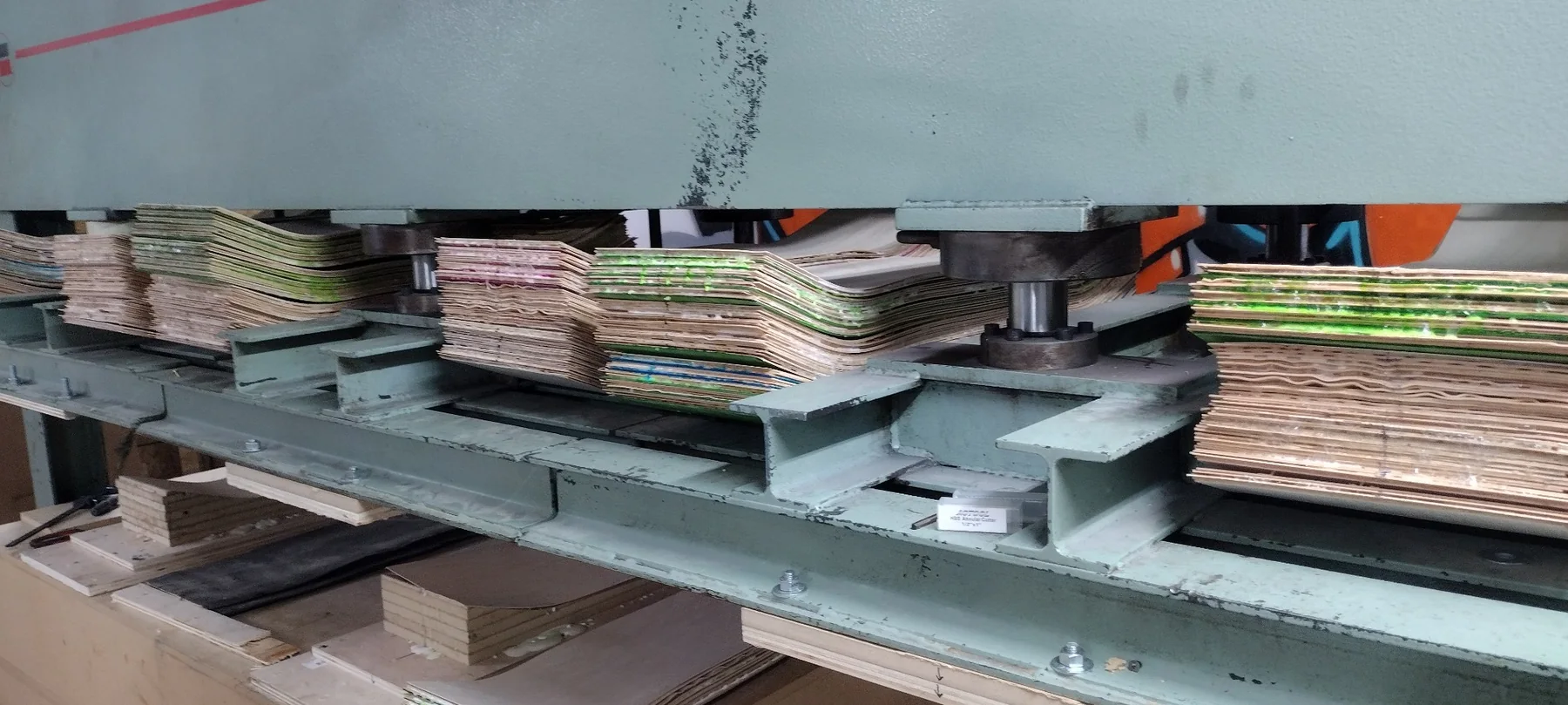 Skateboard molds loaded in the Empire production press